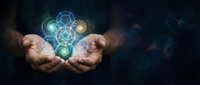 Cupped hands holding glowing geometric molecular structures with blue and green light effects against dark cosmic background for science and technology concepts.