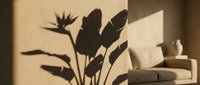 Tropical plant shadow cast on a warm beige wall in a modern minimalist living room with a neutral sofa and ceramic vase.