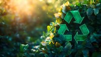 Green recycling symbol surrounded by fresh spring leaves and natural sunlight bokeh, representing environmental conservation and sustainability in nature.