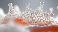 Liquid crown splash frozen in time with intricate honeycomb pattern structure in white and orange colors creating abstract macro photography effect.