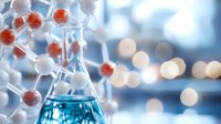 Molecular model with red and white atoms surrounding laboratory flask containing blue liquid against blurred scientific background.