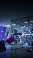 Businessman hand touching holographic data visualization interface with glowing charts and analytics for business technology and digital transformation applications.