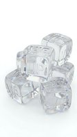 Crystal clear ice cubes with VIP text embossed on white background for luxury hospitality and premium service concepts.