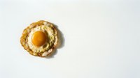 Fried egg with golden yolk and crispy edges isolated on white background for culinary designs and breakfast concepts.