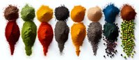 Colorful spices and seasonings arranged in neat rows on white background, including paprika, turmeric, black pepper, matcha powder and peppercorns. Food photography.