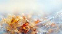 Autumn leaves with warm bokeh lights creating magical seasonal atmosphere for holiday decorations and cozy interior design projects.