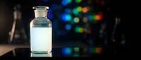 Clear glass vial with white liquid medicine or vaccine on dark laboratory table with colorful bokeh lights background for medical research and pharmaceutical development.