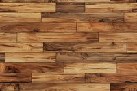 Natural wooden parquet flooring pattern with rich brown tones and distinctive grain texture creates seamless background for interior design projects.