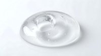 Translucent silicone donut-shaped suction cup with central hole, isolated on white background for product design, packaging, and industrial applications.