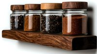 Glass jars with wooden lids containing various spices and seasonings arranged on wooden shelf for kitchen organization and culinary preparation.