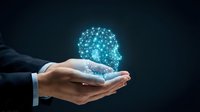 Businessman hands holding glowing digital brain with connected network nodes representing artificial intelligence and machine learning technology.