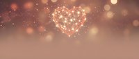 Glowing network heart shape with connected dots and lines on warm bokeh background for romantic technology concepts and digital love themes.
