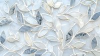Elegant floral mosaic pattern in white and blue marble featuring delicate leaf shapes and curved branches creates luxurious decorative surface design for interior walls.