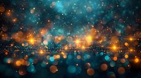 Abstract festive background with glowing turquoise and golden bokeh lights creating magical atmosphere, defocused sparkles and particles floating in dark space.