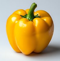 Fresh yellow bell pepper with bright green stem isolated on light background, close-up view showing glossy surface and natural texture. Suitable for food packaging.