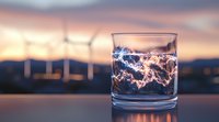 Glass of water with lightning effect against sunset skyline, creative double exposure photography combining nature and cityscape elements in moody atmosphere.