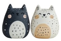 Adorable black and white cat figurines with starry patterns, smiling faces, and rounded bodies. Decorative ceramic ornaments for home decor.