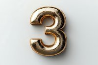 Gold metallic balloon number three on light gray background, inflated foil digit with shiny reflective surface isolated for celebration and party design.