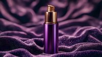 Purple cosmetic bottle with gold dispenser pump on luxurious velvet fabric background with soft folds and dramatic lighting for beauty product photography.