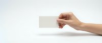 Hand holding blank white business card mockup on clean background for branding and corporate identity design projects.