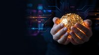 Businessman hand holding glowing golden brain with circuit board patterns and digital technology elements on dark background for innovation and artificial intelligence concepts.