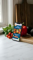 Smartphone displaying food delivery app on kitchen counter with fresh vegetables and cutting board for online ordering and meal planning.