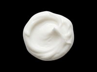 White cream swirl isolated on transparent background, ready for beauty, skincare, and cosmetic design use. Great for stickers, clipart, and print on demand projects.