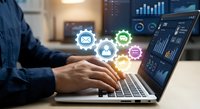 Professional businessman typing on laptop with digital marketing icons and analytics dashboard displaying data visualization charts and graphs for business strategy.