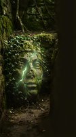 Ancient stone face sculpture covered in moss and ivy vines in mysterious forest setting with atmospheric green lighting for fantasy and mythology themes.