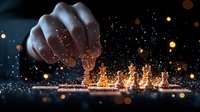 Dramatic close-up of hand sprinkling glowing magical powder creating illuminated Christmas tree silhouettes against dark background with sparkling bokeh lights.