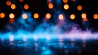 Abstract blue smoke with warm orange bokeh lights creating atmospheric background for creative projects and digital designs.