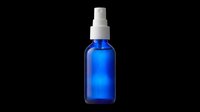 Blue glass spray bottle with white pump cap, isolated on transparent background. Ready for cosmetic, skincare, and product packaging designs, stickers, and print on demand.