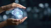 Hand holding glowing digital brain with neural network connections, representing artificial intelligence, machine learning, innovation, and futuristic technology concepts for business solutions.