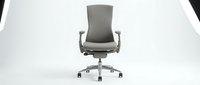 Modern gray office chair with ergonomic design, adjustable armrests and wheels, isolated on white background for interior design and workspace projects.