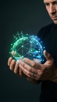 Businessman holding holographic Earth globe with renewable energy symbols and network connections representing sustainable technology and environmental innovation.