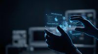 Hands holding smartphone with holographic data visualization interface displaying analytics charts and digital information in futuristic technology concept.