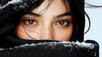 Close up portrait of young Asian woman with brown eyes and freckles peeking over black fabric, with windswept hair against dark background. Mysterious and dramatic mood.
