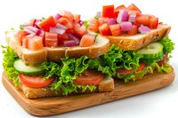 Fresh salmon sandwich with diced raw fish, cucumber, tomato, red onion and lettuce on toasted bread, served on wooden board. Perfect for menu, restaurant promotion or food blog.