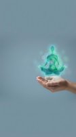 Glowing turquoise meditation figure floating above open palm with energy aura and chakras on gray background for wellness and spiritual healing concepts.