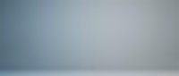Empty studio backdrop with soft gray gradient lighting for product photography and professional presentations.