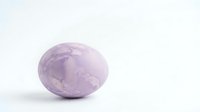 Purple amethyst gemstone with natural crystal formations on clean white background, isolated mineral specimen for jewelry design and healing crystal collections.