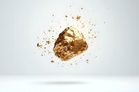Gold nugget with exploding particles on white background, isolated mineral fragment for luxury jewelry or mining industry concepts.