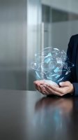 Businessman hands holding futuristic digital network sphere with security icons and data connections in modern office environment for technology concepts.