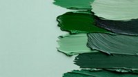 Textured green oil paint strokes creating abstract layers with varied shades and thickness, showing artistic brush movement and paint texture on canvas surface.