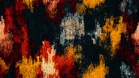 Abstract knitted pattern in dark moody colors with red, orange and grey splashes on black background creates dramatic autumn atmosphere. Seamless repeat design.
