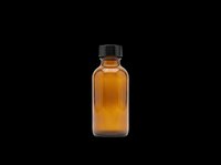Amber glass bottle with black cap isolated on transparent background, ready for design use on product labels, packaging mockups, sublimation, and print-on-demand applications.