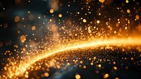 Magical golden light trail with glowing sparkles and bokeh effect on dark background creates atmospheric festive mood for holiday designs and celebrations.