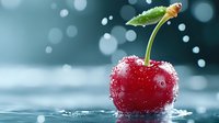 Fresh red cherry with water droplets and green stem creating splash on blue bokeh background for healthy eating and summer fruit concepts.