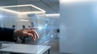 Businessman in dark suit interacting with holographic financial data display showing stock charts and analytics in modern office environment for business technology concepts.
