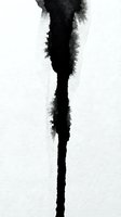 Abstract black ink bleed on white textured paper creating organic vertical drip pattern for artistic design projects and creative backgrounds.